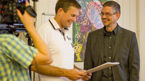 Andreas Mogensen and Poul Rasmussen at the press conference where the logo was reveiled